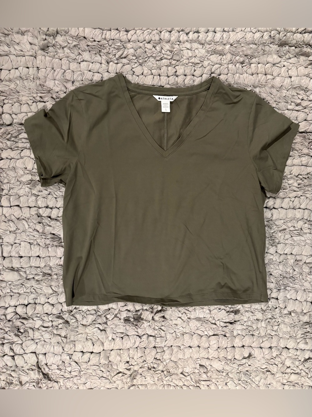 Athleta Women’s V-Neck Short Sleeve Top in Olive - slightly cropped style